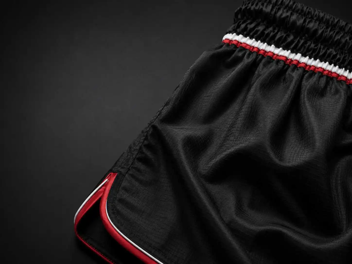 black athletic fabric with red short