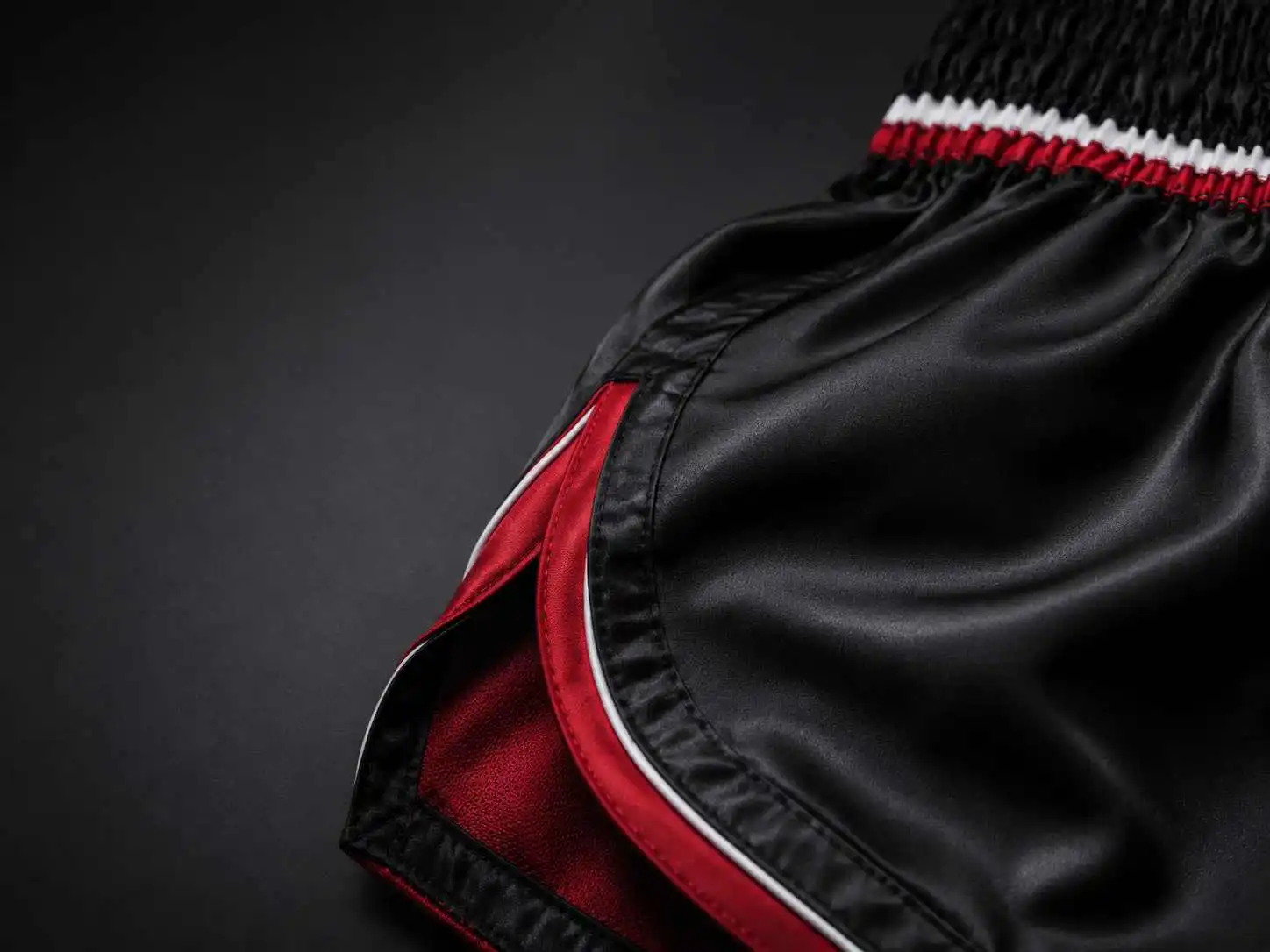 glossy black athletic shorts detail