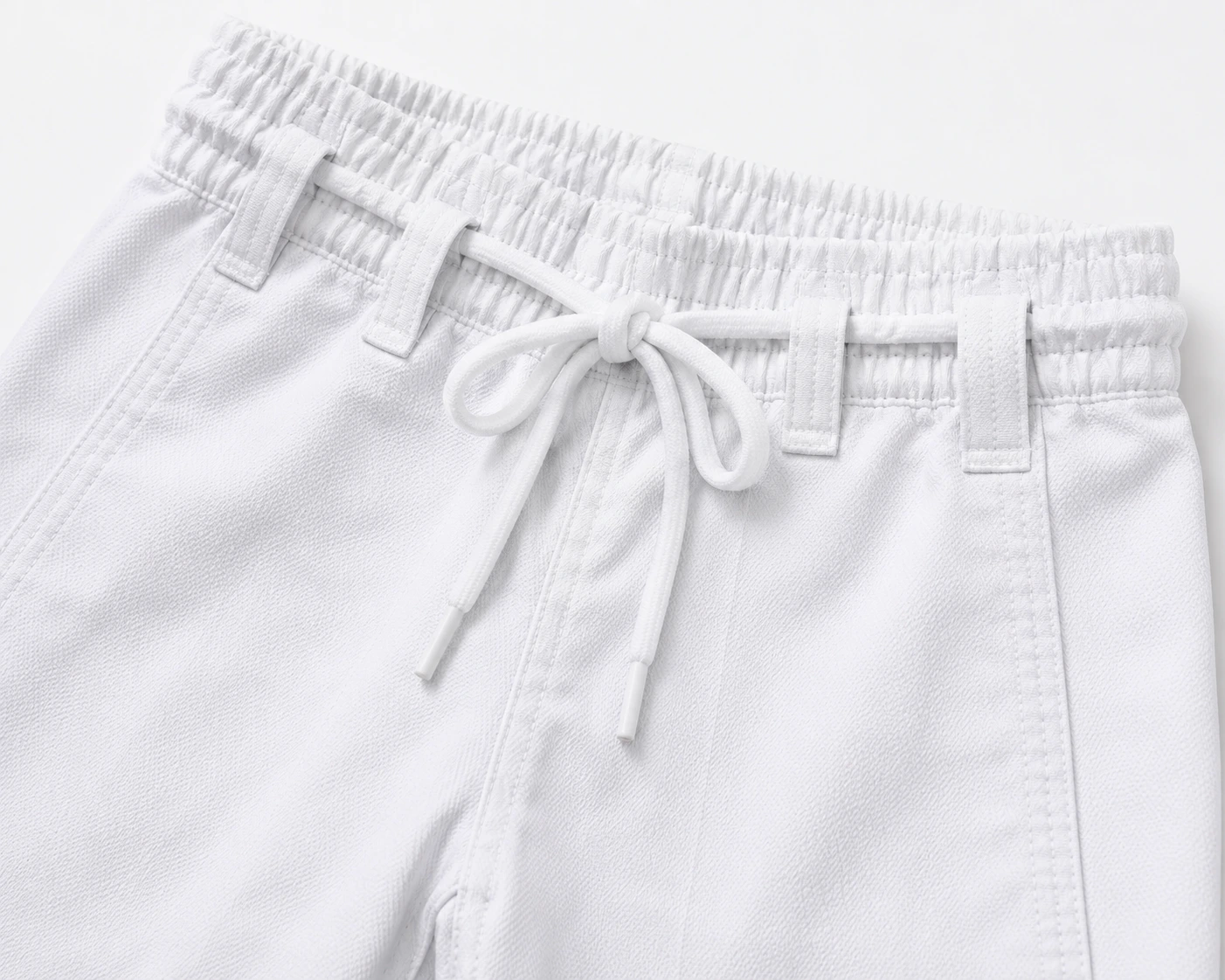 lose-up of an elastic karate gi trouser waistband with secure drawstring