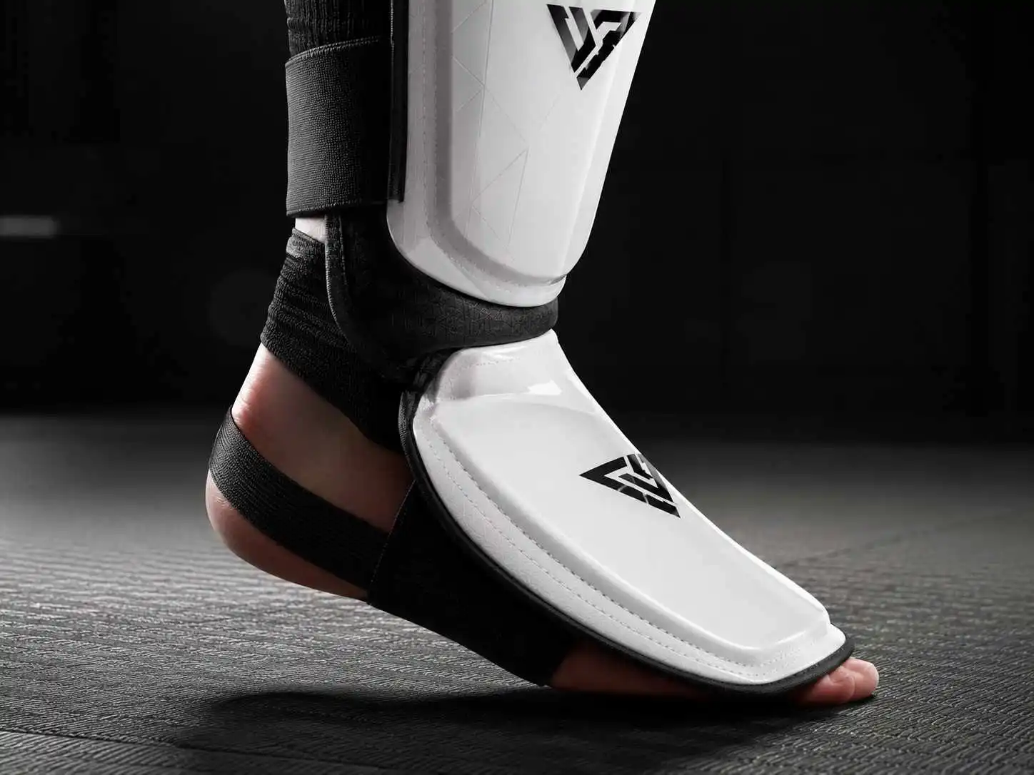shin-guard-heel-loops
